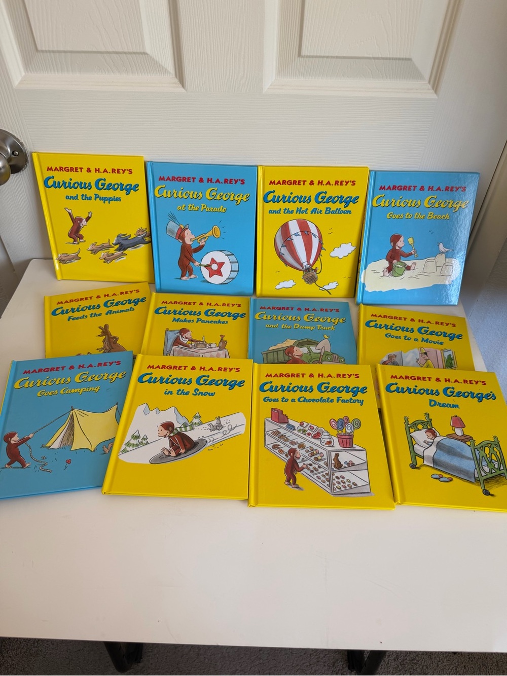 Curious George Classic Hardcover Book Set - Yellow & Blue Covers 12 book set